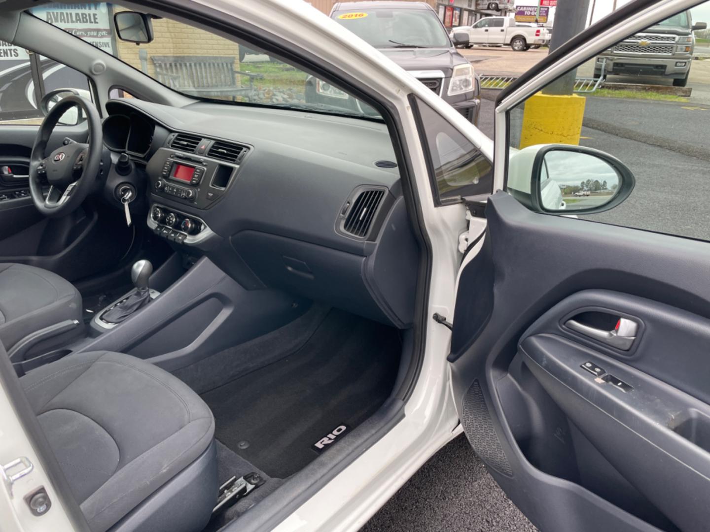 2014 White Kia Rio (KNADN4A35E6) with an 4-Cyl, 1.6 Liter engine, Automatic, 6-Spd transmission, located at 8008 Warden Rd, Sherwood, AR, 72120, (501) 801-6100, 34.830078, -92.186684 - Photo#8